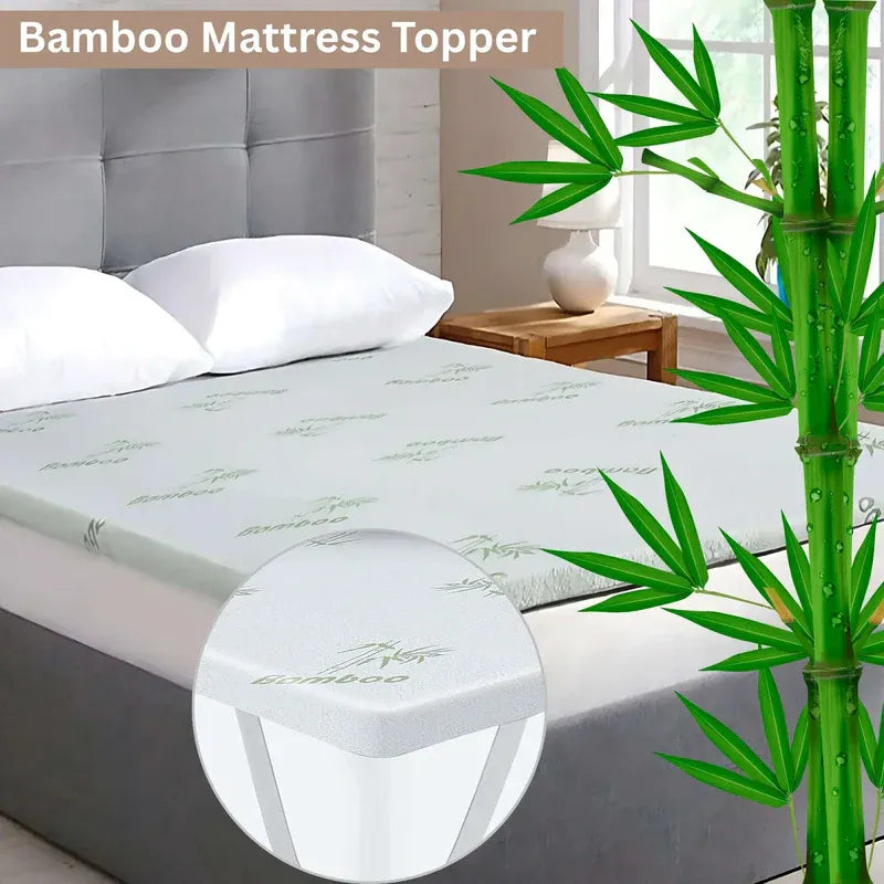 Bamboo mattress topper on a bed with bamboo plant and 'Bambu' branding.