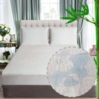Mattress topper on a bed with a room setting including curtains and decor.