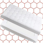 Two white rectangular objects on a red hexagonal patterned background