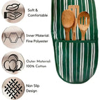 Green and white striped apron with wooden utensils, material details on a white background