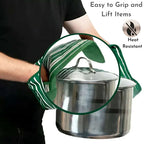 Person holding a pot with green gloves, emphasizing ease of grip and heat resistance.