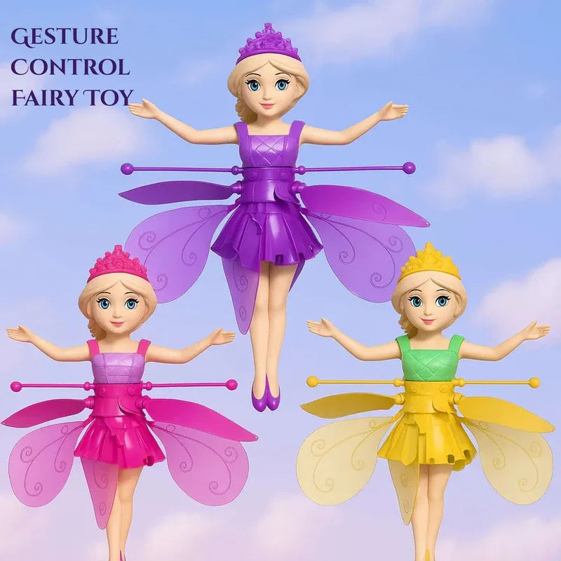 Three fairy toy dolls with colorful dresses and wings against a blue sky background.