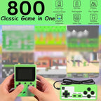 Green handheld game console with controller displaying '800 Classic Game in One' on a blurred background.