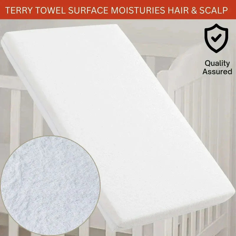 White terry towel on a crib with close-up of texture and 'Quality Assured' badge.