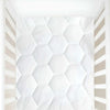 White textured wall with geometric pattern