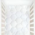 White textured wall with geometric pattern
