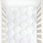 White textured wall with geometric pattern