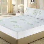 Bamboo mattress cover set on a bed in a bedroom setting