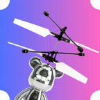 Metallic bear-shaped toy with helicopter blades on a colorful gradient background