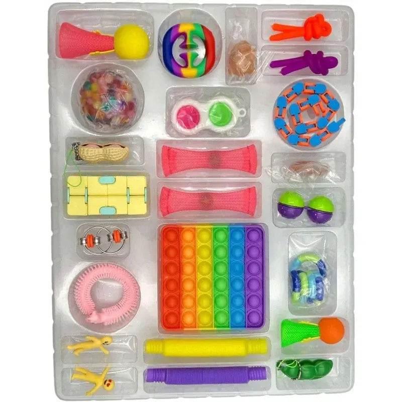 Assorted colorful sensory toys in a clear plastic case on a white background