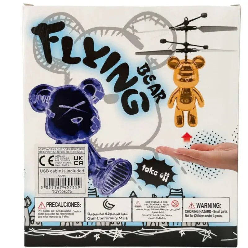 Box of a flying bear toy with colorful graphics and text.