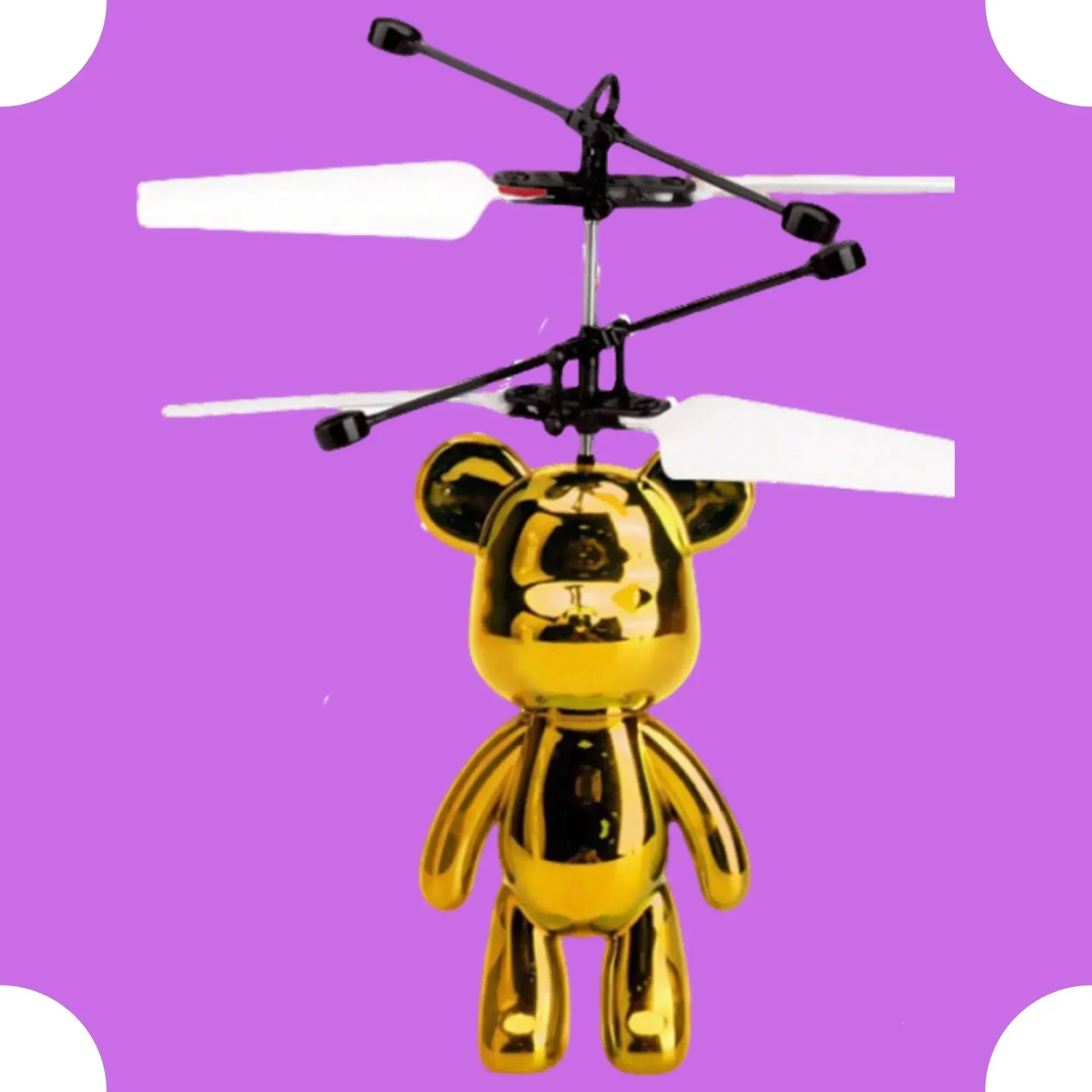 Gold teddy bear-shaped helicopter on a purple background