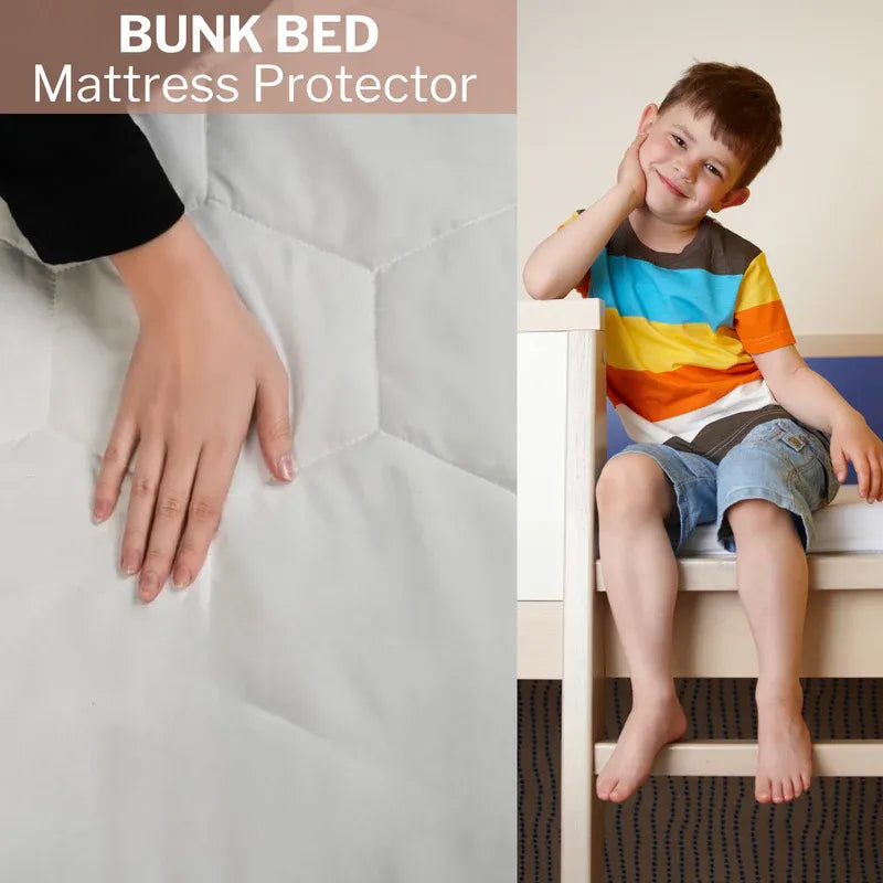 A bunk bed mattress protector shown in a split lifestyle image: on the left, a hand rests on a light gray quilted protector, and on the right, a smiling child sits on the bed frame wearing the protector. Text at the top reads 'BUNK BED Mattress Protector.