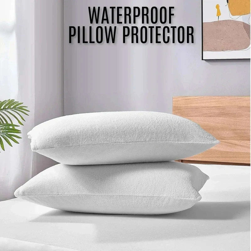 Two white pillows on a bed with 'Waterproof Pillow Protector' text above.