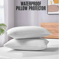 Two white pillows on a bed with 'Waterproof Pillow Protector' text above.